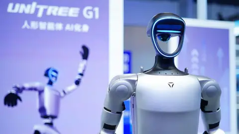 VCG via Getty Images A Unitree G1 humanoid robot is on display at a convention in Beijing.
